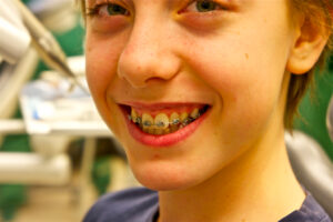 A patient at a modern dental clinic during a cosmetic consultation